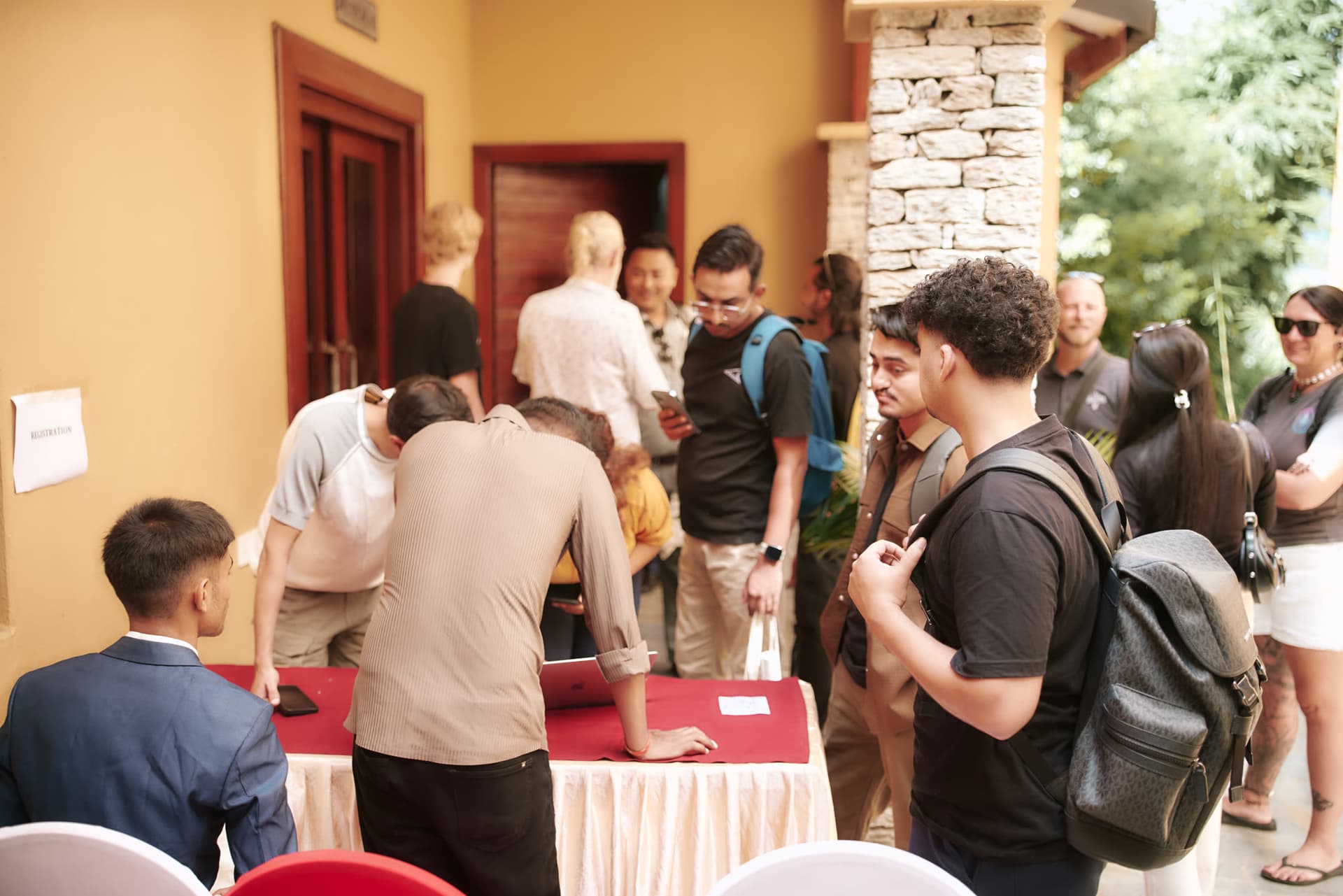 Attendees checking in at the Nomads Basecamp 2025 registration desk
